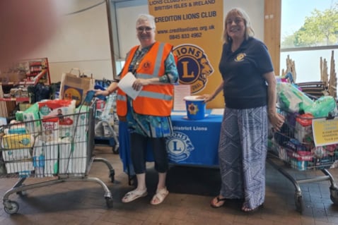 Carol Hartshorne and Karen Todd during the Crediton Lions collection of items for Ukraine.