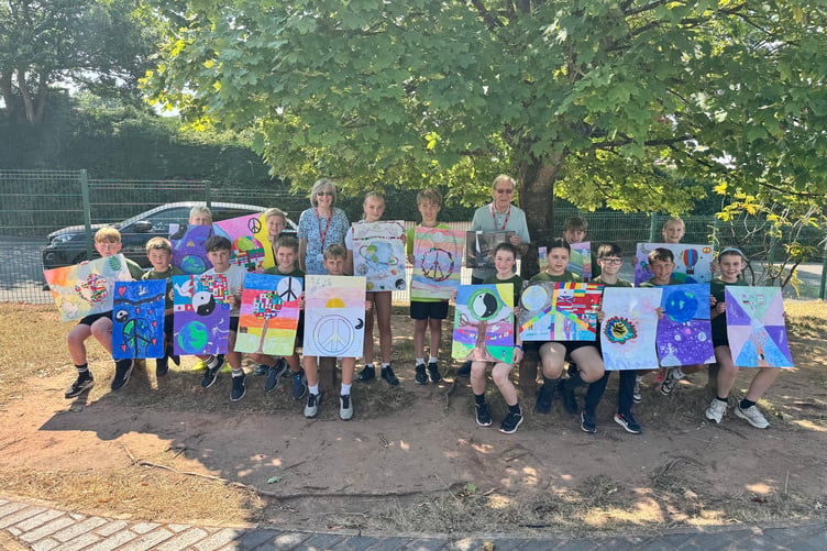 The Copplestone schoolchildren with their Peace Posters. AQ 5567