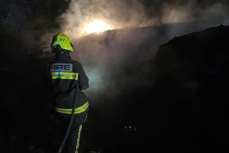 A firefighter at the fire at Sutcombe, near Holsworthy.