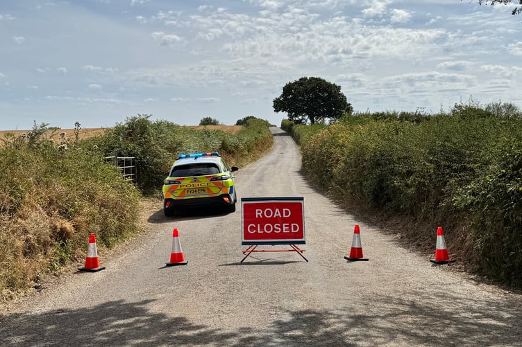 The police road closure between Yeoford and Woodland Head. AQ 7305