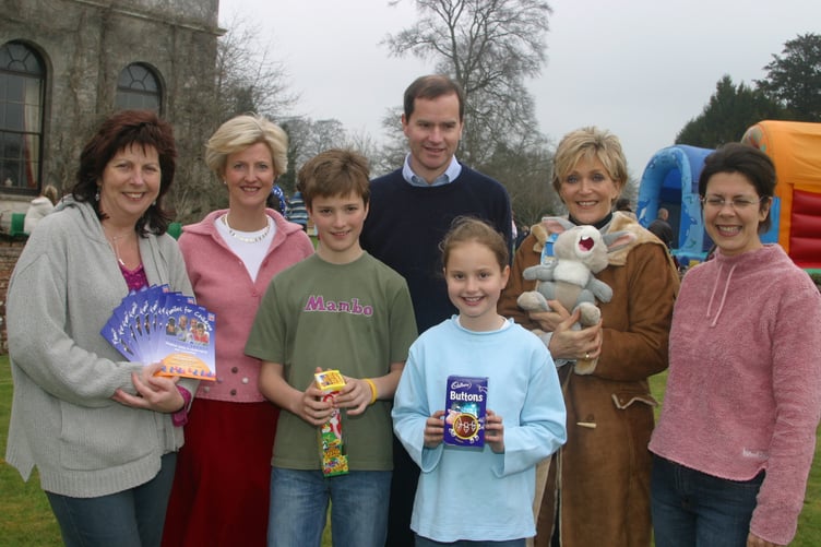 BBC Radio Devon presenter Judi Spiers opened an Easter egg hunt at Downes in aid of Families for Children Adoption Agency. With Judi and Gus Honeybun are members of the Parker family and representatives from the charity in March 2005. 249-4924_IMG