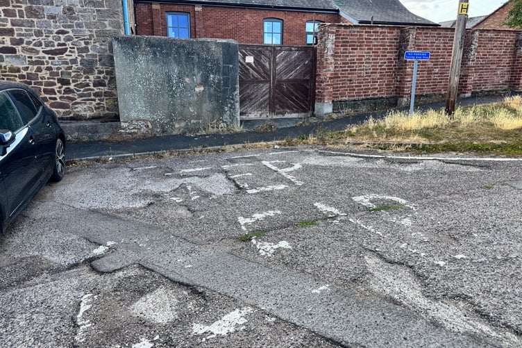 Where a ‘KEEP CLEAR’ signs needs repainting at the bottom of Waresfoot Drive. AQ 7730