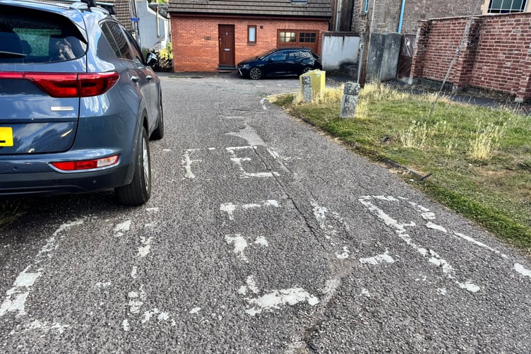 Where one of the ‘KEEP CLEAR’ signs needs repainting at the bottom of Waresfoot Drive. AQ 7728