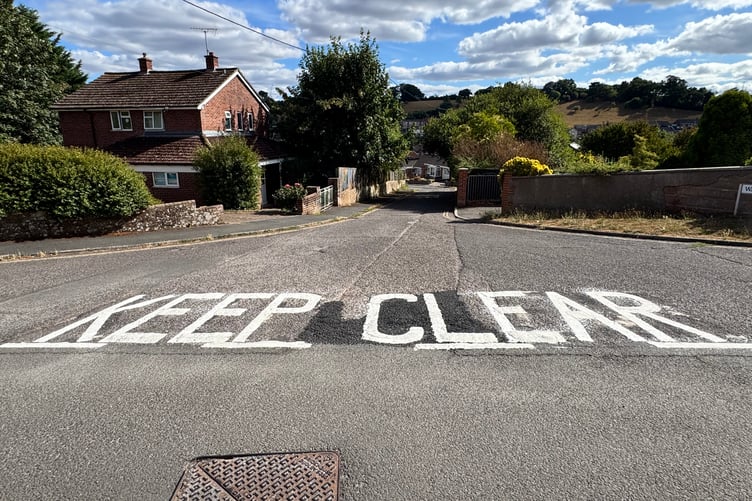 The ‘KEEP CLEAR’ road marking in the wrong location at the top of Waresfoot Drive, Crediton. AQ 7724