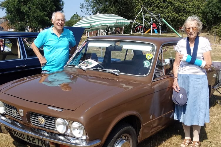 Owners with their Triumph car at Lapford Vintage Rally.