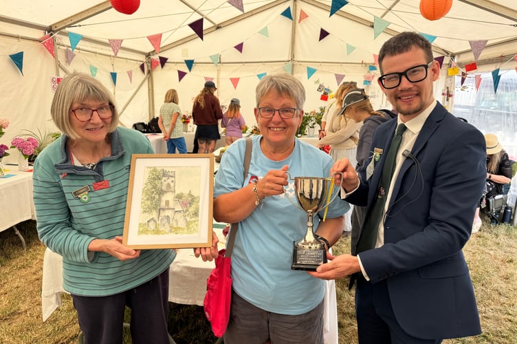 Most points in the Harvest and Home competitions went to Amanda Gartshore of Ilfracombe, pictured with steward Margaret Allin, left and steward Frank Watson, right. AQ 7433