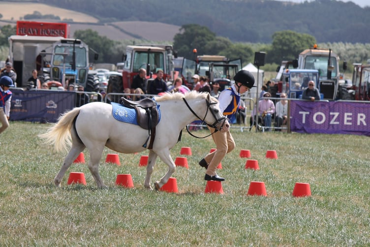 A competitor in the Pony Club Mounted Games. AQ 1768