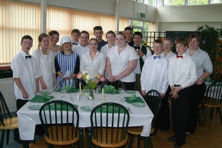 Members of the Crediton Ecumenical Church Youth Club organised a four-course dinner for invited guests in May 2004. 185-8575_IMG