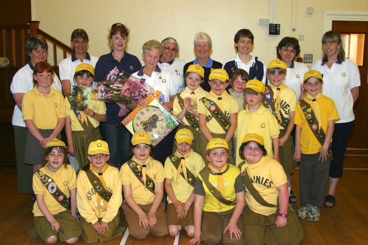North Tawton Brownies with Monica Simons, centre, who was retiring as Brown Owl in May 2004. 191-9107_IMG