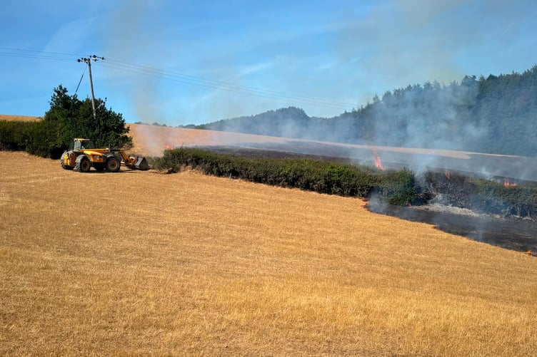 Fighting the fire at Little Harford, Tedburn St Mary.