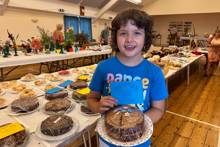 Elodie (9) won a second prize at Spreyton with their Coffee Victoria Sandwich. AQ 9106