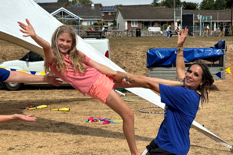 Gymnastic fun with Higher Beings Circus at Arts in the Park. AQ 9068