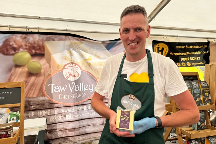 Adam Hooper was busy on the Taw Valley Creamery stand. AQ 8930