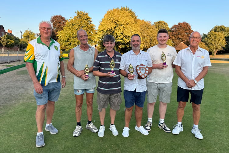 The Industrial Bowls runners-up team from Graphic A with Mike Canning, left, and Paul Radnor, right. AQ 9159