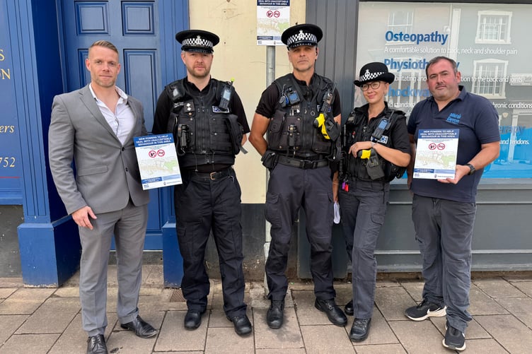 At the launch of the Public Space Protection Order in Crediton, from left, Environment and Enforcement, Grounds Maintenance and Street Cleansing Manager at Mid Devon District Council, Luke Howard; Mid Devon Police Inspector Mark Arthurs; Police Constables Dan Armitage and Emily Ravenscroft and Andrew Green, District Officer, Mid Devon District Council. AQ 9326
