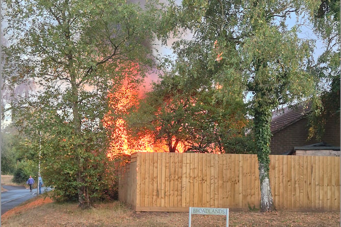 Huge flames from the fire at Broadclose, Thorverton taken by Natasha Farley.