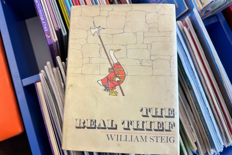 The book Jonathan Lee returned to Crediton Library after 50 years. AQ 9531