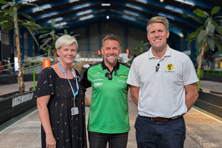 From left, Ellie Melmoth, Partners Manager at Hospiscare, John Doyle, Director at Raceworld Ltd, and Pete Randerson, Agent at NFU Mutual Exeter, Tiverton and South Molton Agency.