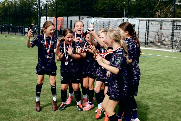 One of the winning teams at girls' grassroots football tournament.