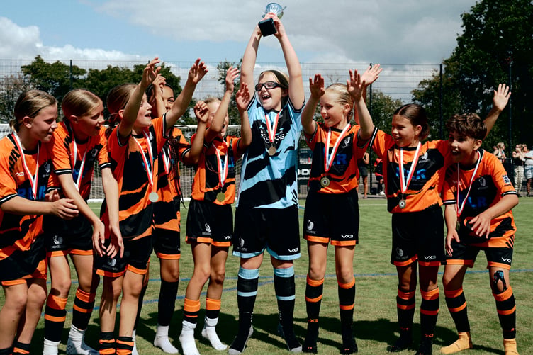 One of the winning teams at girls' grassroots football tournament.