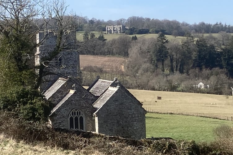 A view of Eggesford Church and in the distance, Eggesford House.