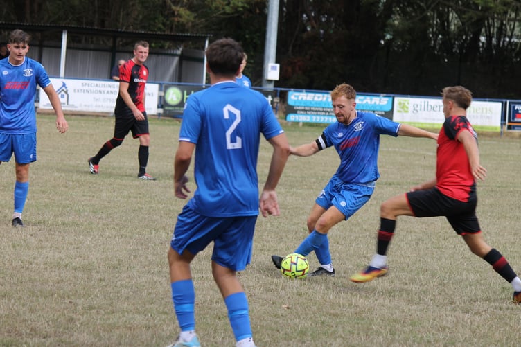 Crediton in possession as Bridport try for the ball. AQ 2134