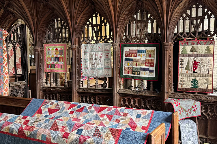 A view of some of the quilts in St Matthew’s Church. AQ 0139