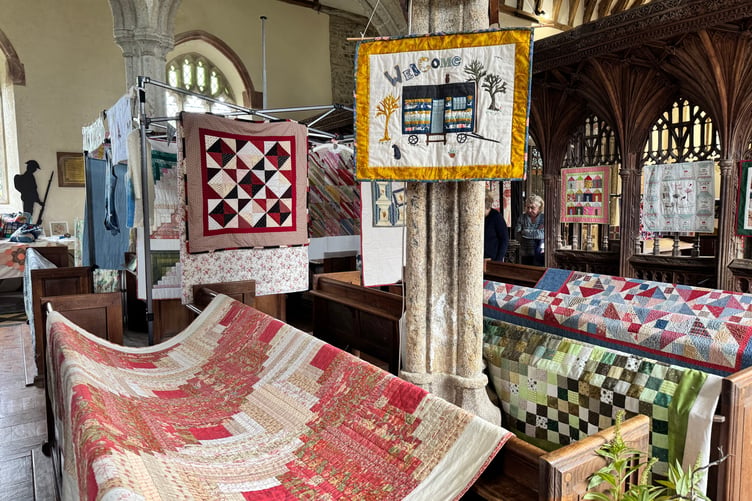 A view of some of the quilts in St Matthew’s Church. AQ 0131