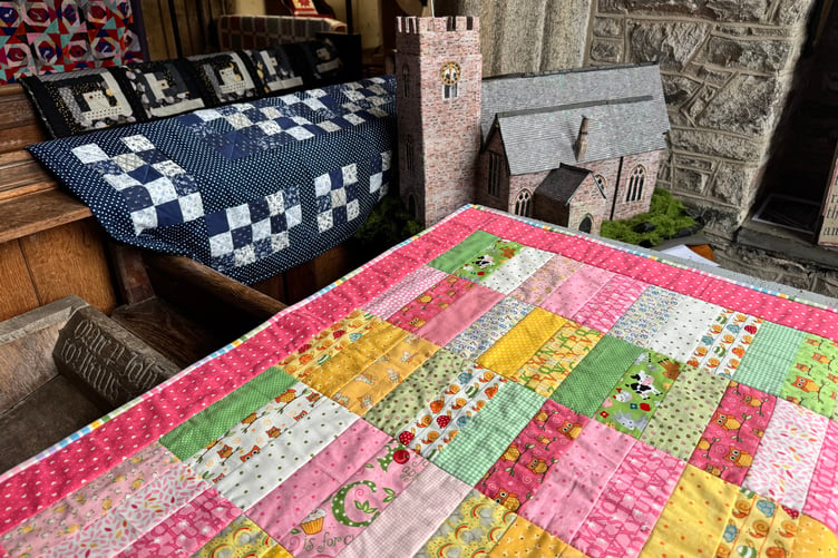Colourful quilts in the Coldridge exhibition. AQ 0130