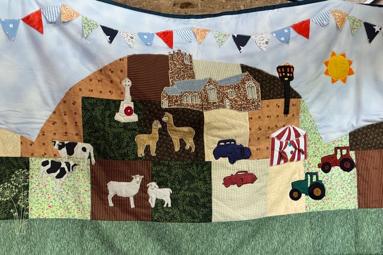 A quilt created by the Quilting Club for a previous Coldridge fete. AQ 0112