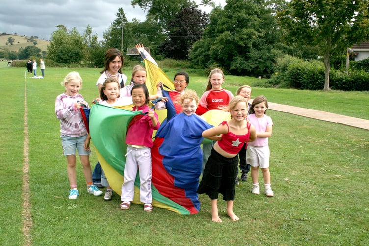 Children who had fun in the parachute game at the two-day Sandford Games in September 2006. IMG_4985