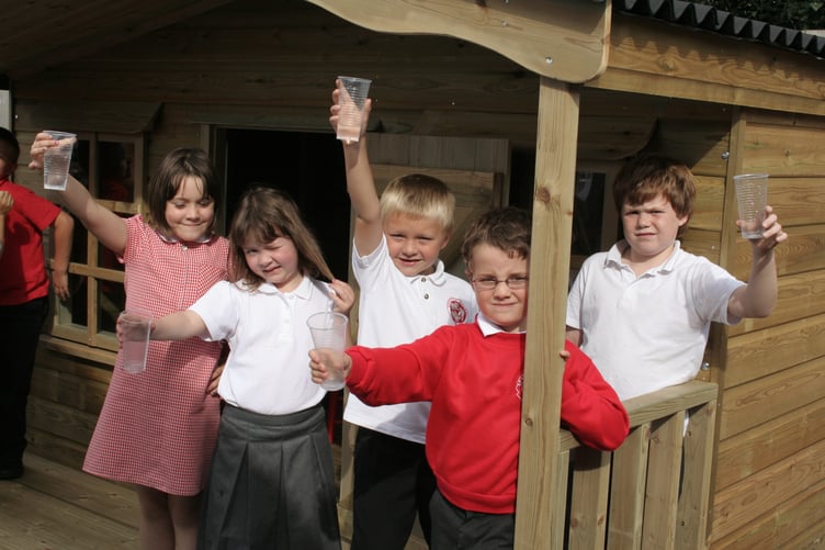 Children at Spreyton School were happy to receive a new playhouse in September 2006. IMG_5133