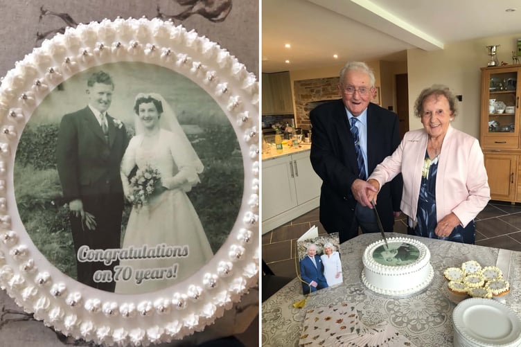 The image of Austin and Gwen on their wedding day on their cake and cutting the cake.