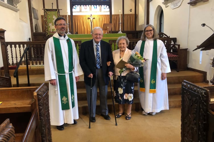 Austin and Gwen Cleverdon 70 years after they were married at St Swithin’s Church, Sandford with Rev Jeremy Putnam and Rev Janet May.
