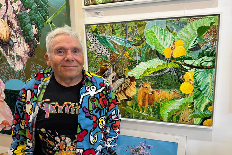 Artist and Illustrator John Hurford with some of his works at Art Plus Frames Gallery. AQ 0730
