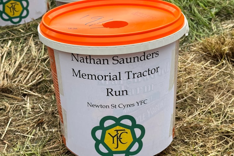 One of the charity collection buckets. AQ 1977
