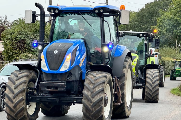 Tractors passing through Black Dog on the Memorial Tractor Run. AQ 2041