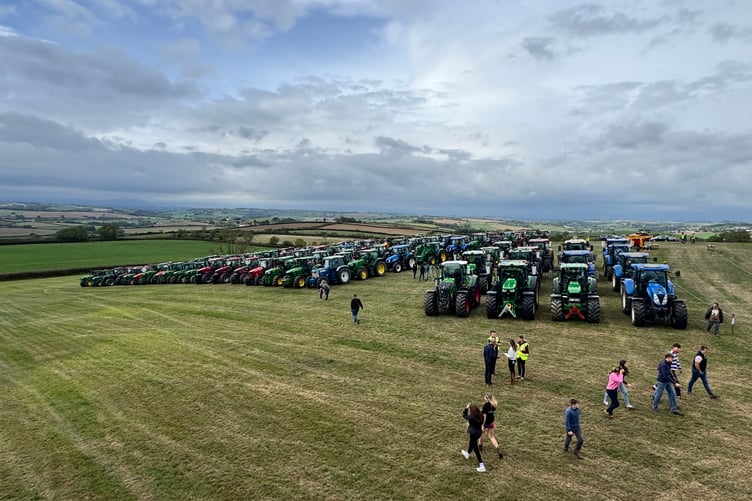 A view of the field of tractors before the Nathan Saunders Memorial Tractor Run. AQ 1988