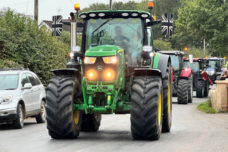 Tractors arriving in Black Dog where a large crowd greeted them. AQ 2046