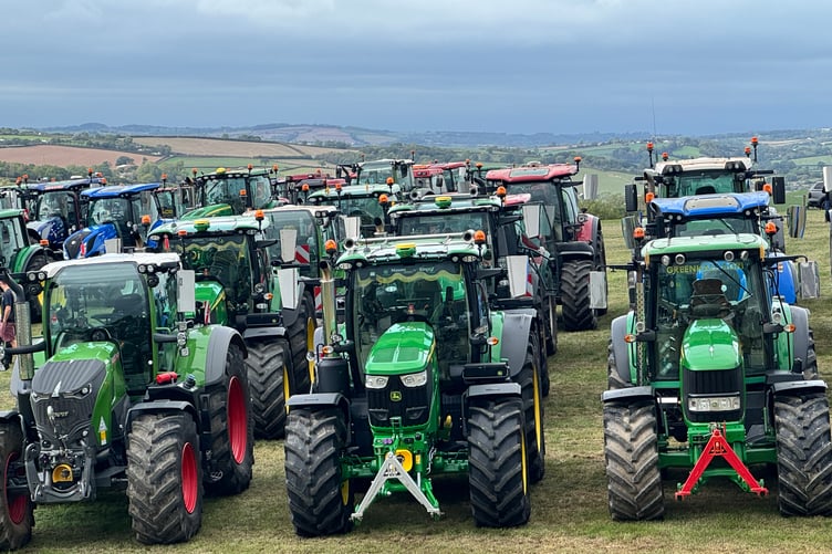 Some of the tractors lined up before the Tractor Run. AQ 1990