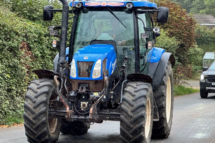 A wave from one of the tractor drivers. AQ 2055