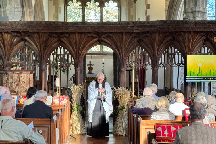 Rev Peter Rapsey led the harvest service at Coldridge Parish Church. AQ 1547