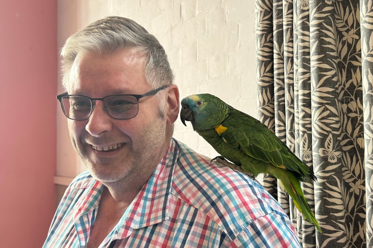 Captain, the famous resident of The New Inn, Colebrooke, was a guest at postie Dave Wright’s party, with landlord, Mark Smeed. AQ 2074