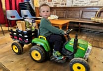 Tractor and trailer used to deliver harvest produce
