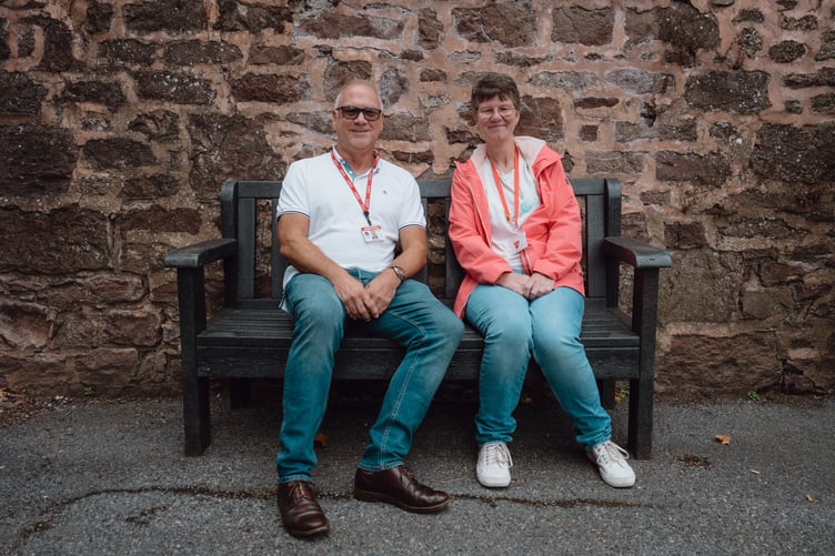 Exeter City Interim General Manager John Street pictured on the Talking Bench with Sharon Dumbleton.