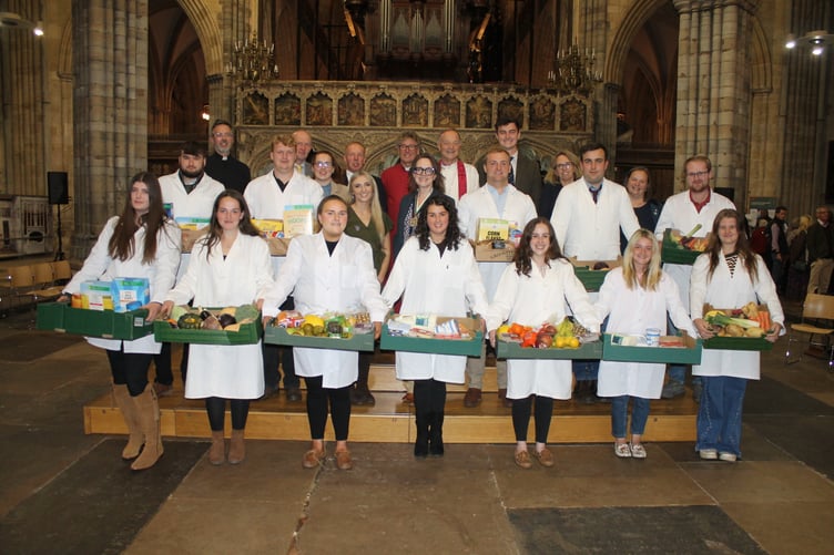 YFC representatives with offerings made during the service, with, back row, Rev Dr Mike Harrison, The Bishop of Exeter, Rev Jeremy Putnam, Rev Stephen Waine, The Mayor Exeter YFC and NFU members and speakers and John Lee, National YFC Chairman. AQ 2226