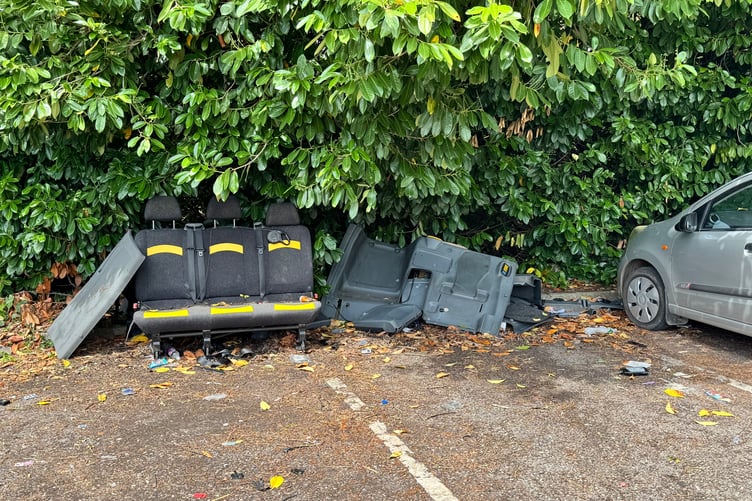 A recent image of dumped rubbish in Crediton Railway Station car park. AQ 4283