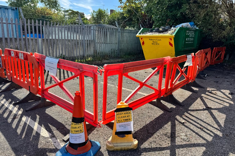 A skip was full of rubbish earlier this week and when this is removed it will greatly help the parking situation. AQ 2727