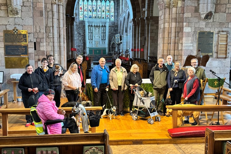 Pets, owners, clergy and other members of the congregation who attended the pet service at Crediton Parish Church. AQ 3338