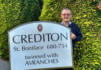 Courier helps retrieve removed road signs